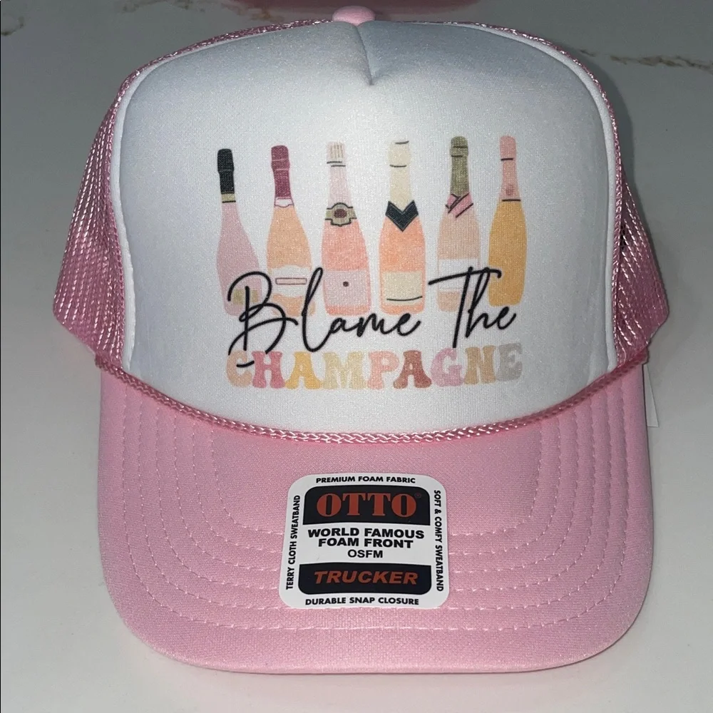 BLAME IT ON THE CHAMPAGNE Pink and White Trucker Hat